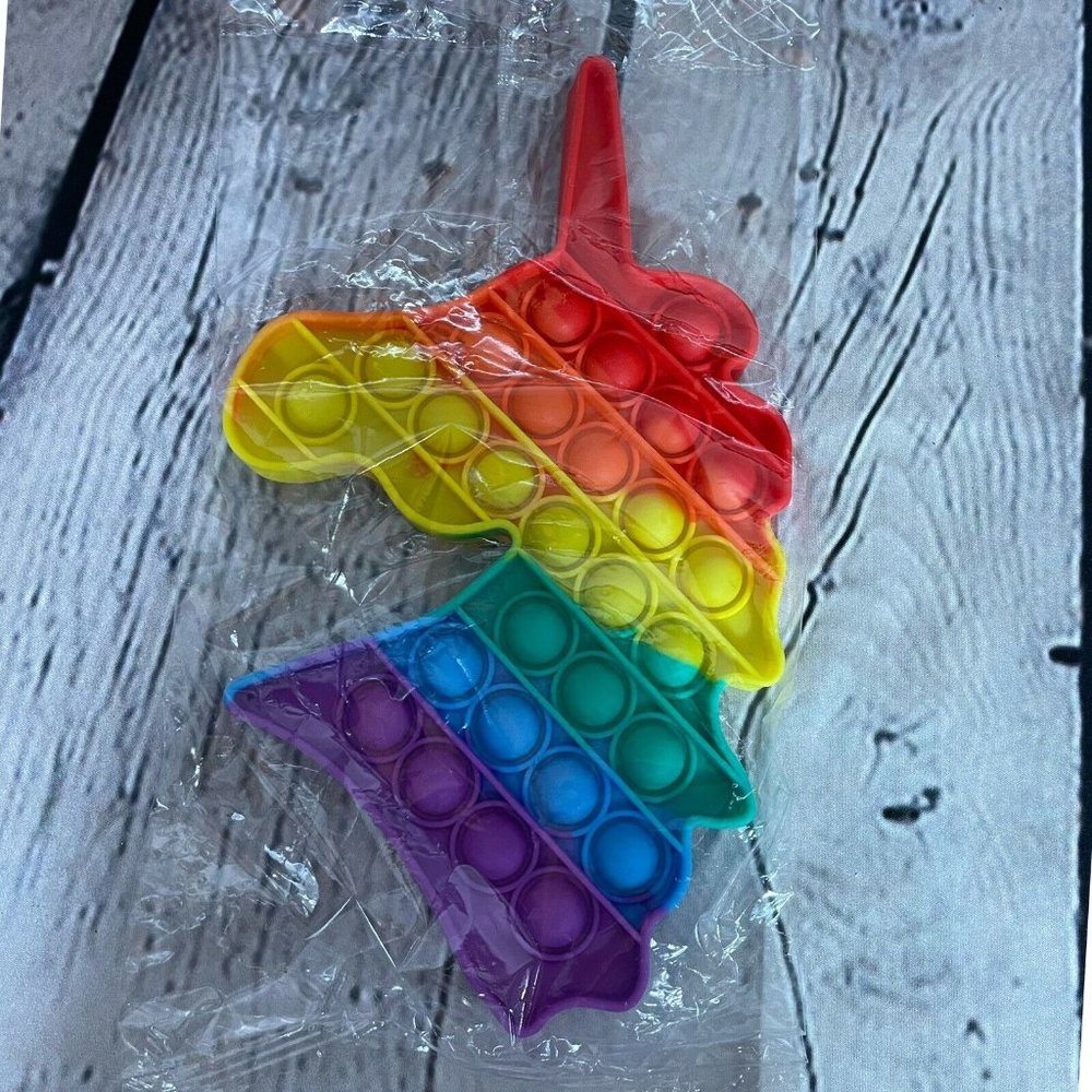 Rainbow Unicorn pop it fidget toy. Medium size